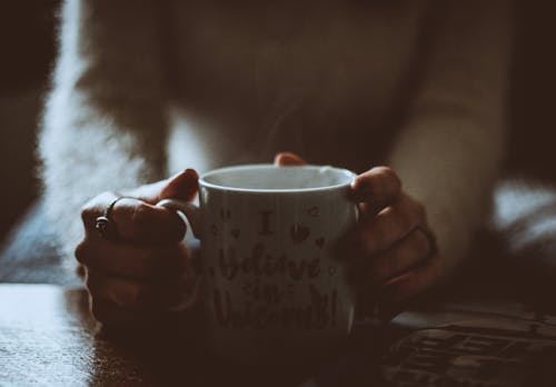 Free Person Holding White Mug Stock Photo