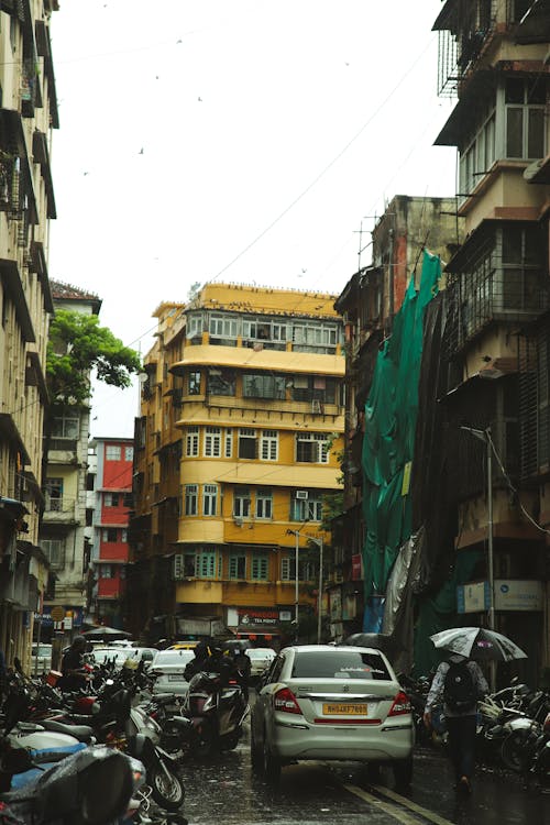 Foto d'estoc gratuïta de carrer, carrers de la ciutat, cotxes