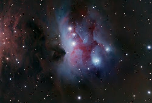 Telescope Shot of a Blue-Violet Nebula