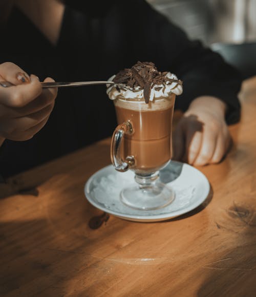 Delicious Coffee with Cream in Glass