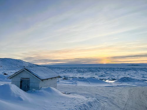 View of a House by the Ocean in the Arctic 