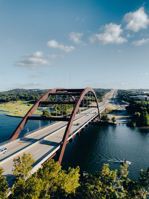 Free A stunning aerial shot of Pennybacker Bridge over Lake Austin on a clear summer day. Stock Photo