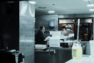 A Woman in a Restaurant Kitchen