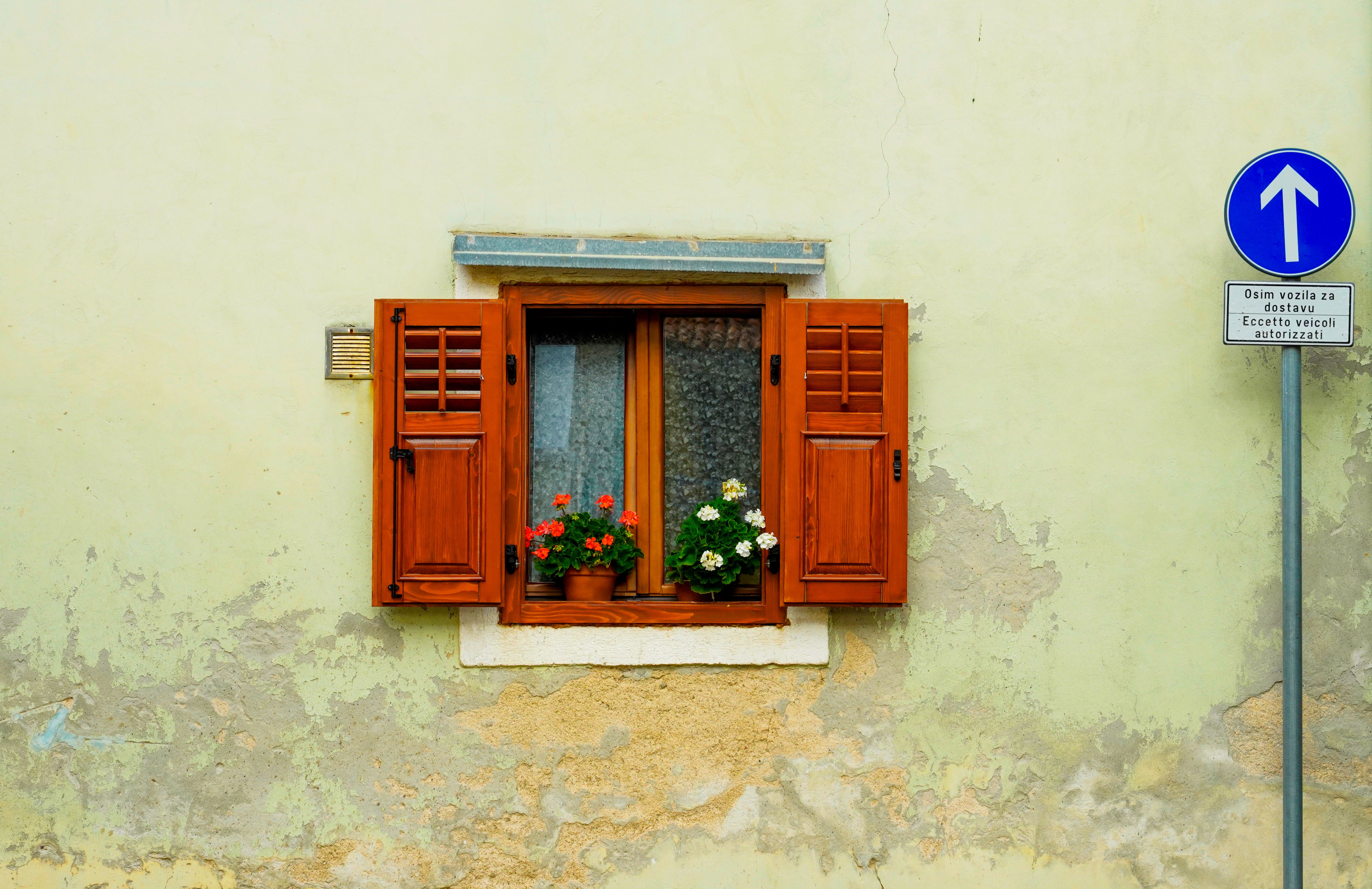 A Window with Wooden Shutters in a Traditional House · Free Stock Photo