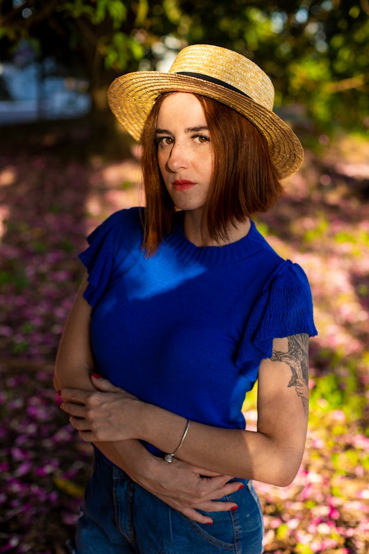 Woman In Hat And With Tattoo