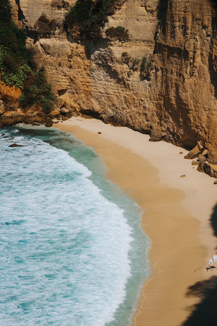 View Of A Cliff And Empty Beach 