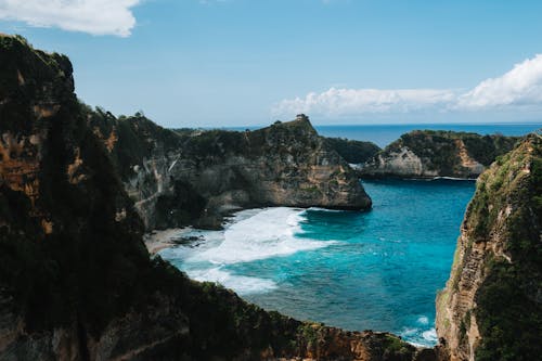 Cliffs around Bay on Sea Shore in Indonesia