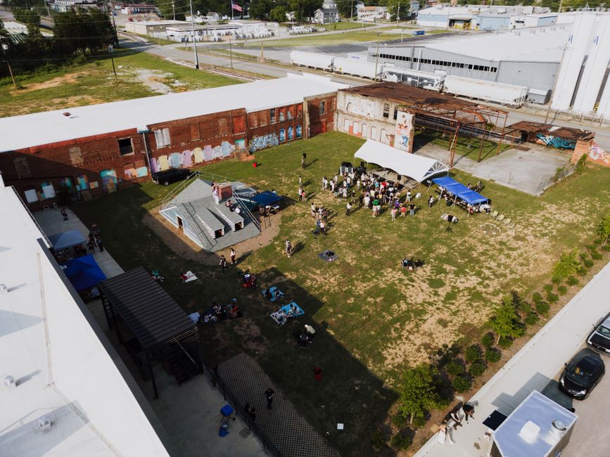 An aerial shot of an outdoor event with people gathering in Chattanooga, TN.
