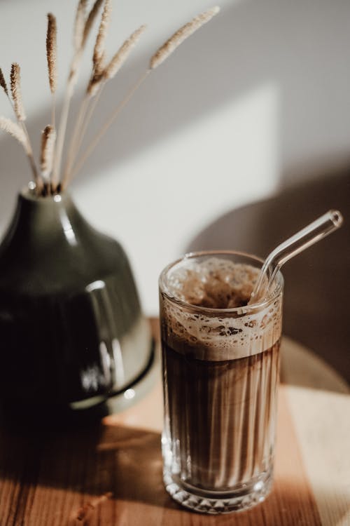 Straw in Glass with Coffee