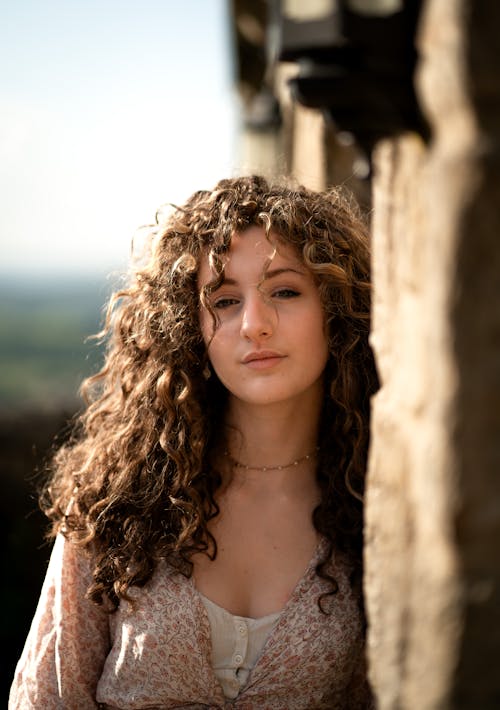 Woman with Long, Curly Hair