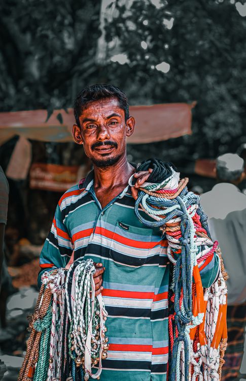 Men In Ropes Man Standing and Holding Ropes · Free Stock Photo