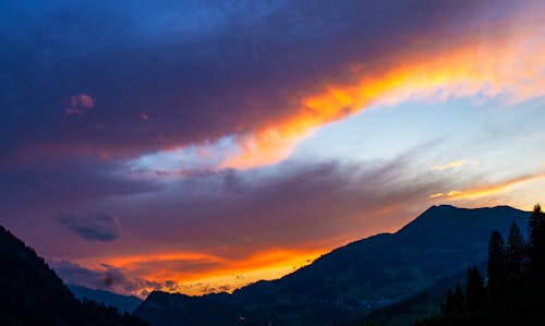 Foto stok gratis matahari sore, pemandangan gunung, pemandangan matahari terbenam
