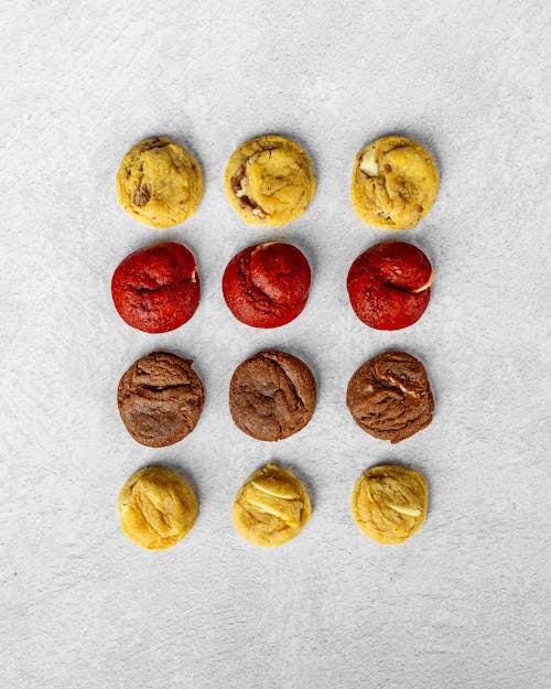 Variety of Cookies Lying on a White Surface