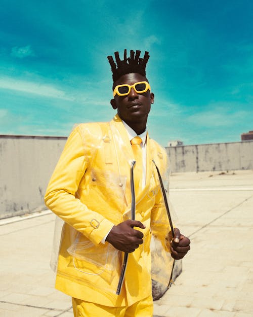 Portrait of Man in Yellow Suit and Sunglasses