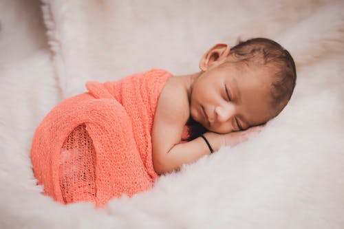 Free A Newborn Sleeping  Stock Photo