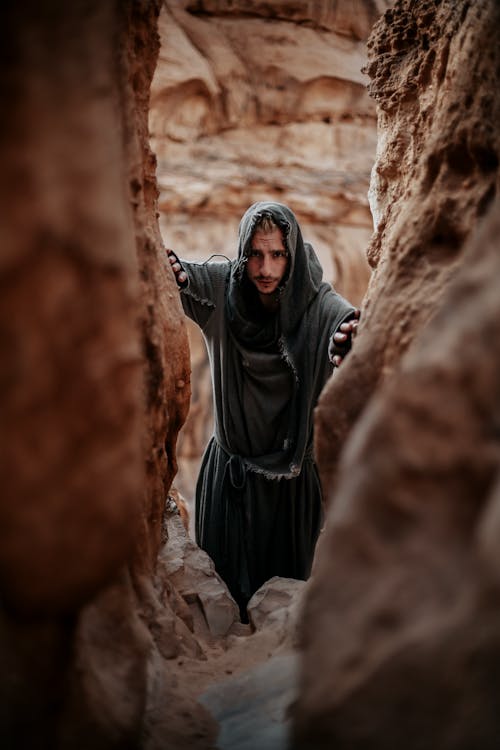 Man in Hermit Robes among Rocks