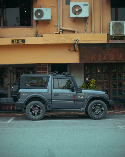 Mahindra Thar SUV Parked in a City Street 