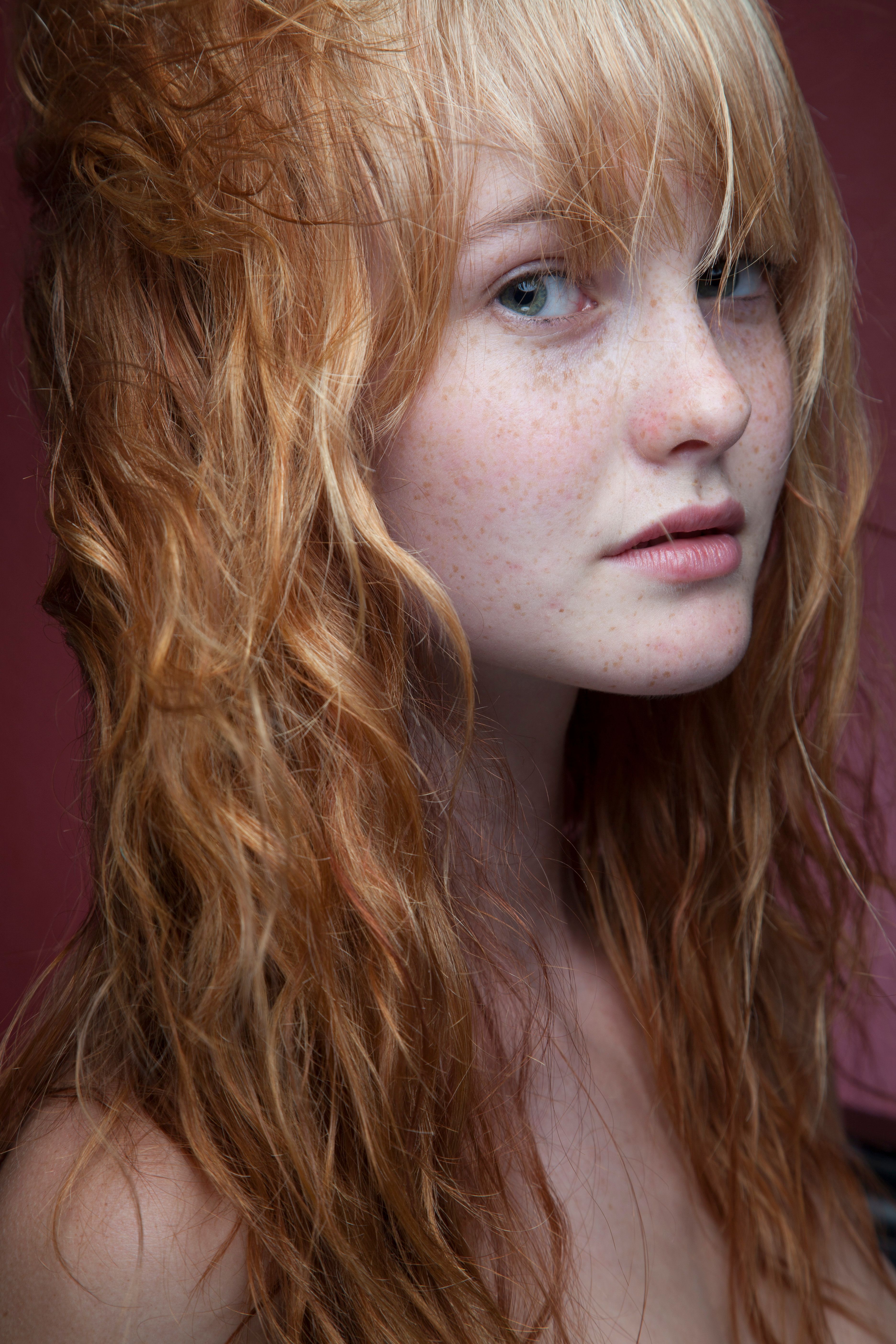 Girl with Long Ginger Hair Holding Daisies · Free Stock Photo