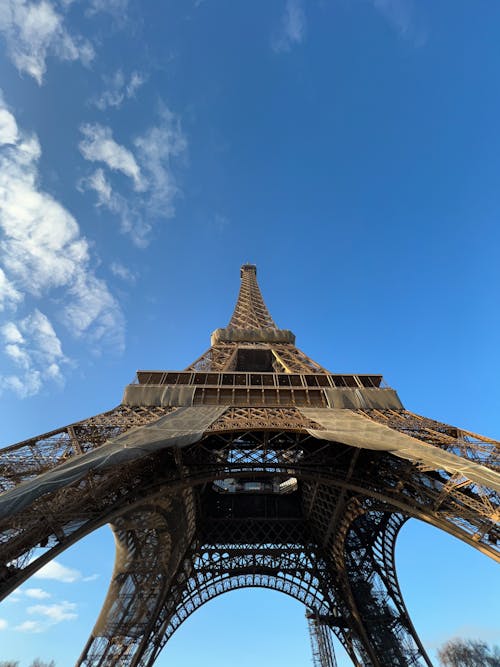 Low Angle Shot of the Eiffel Tower against Blue Sky, Paris, France 