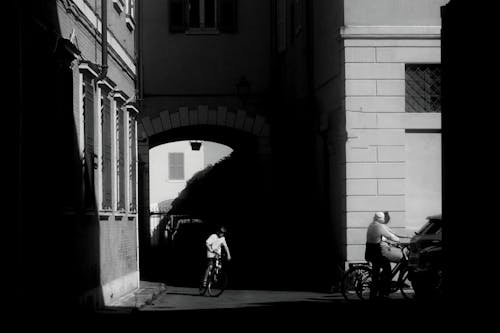 Boy Riding on Urban Street