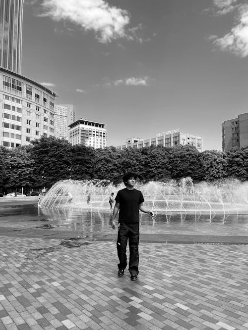 Gratis stockfoto met fontein, kerel, lopen