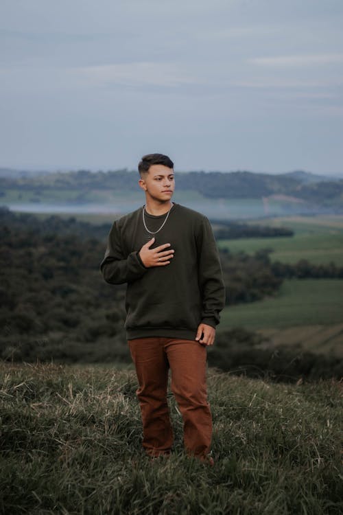 Brunette Man on Grassland