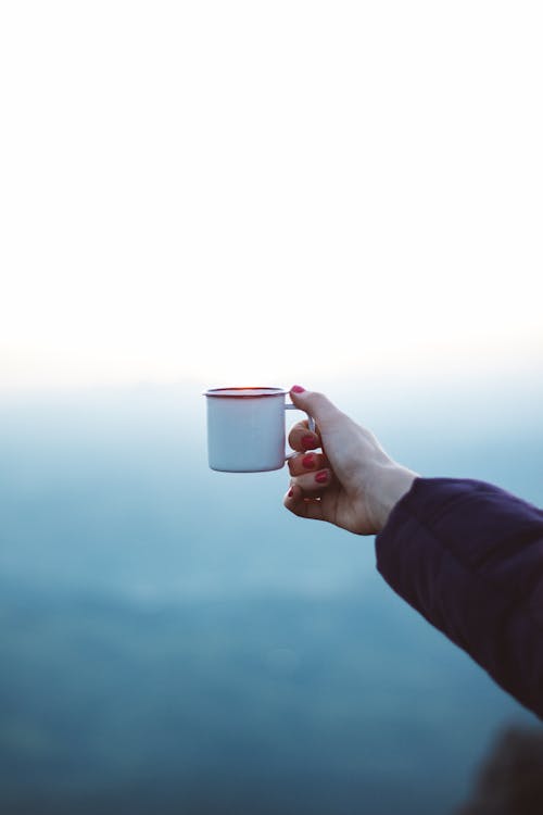 Free Woman Holding White Mug Stock Photo