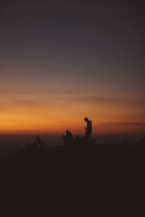 Free Silhouette Photography of Man Standing Stock Photo