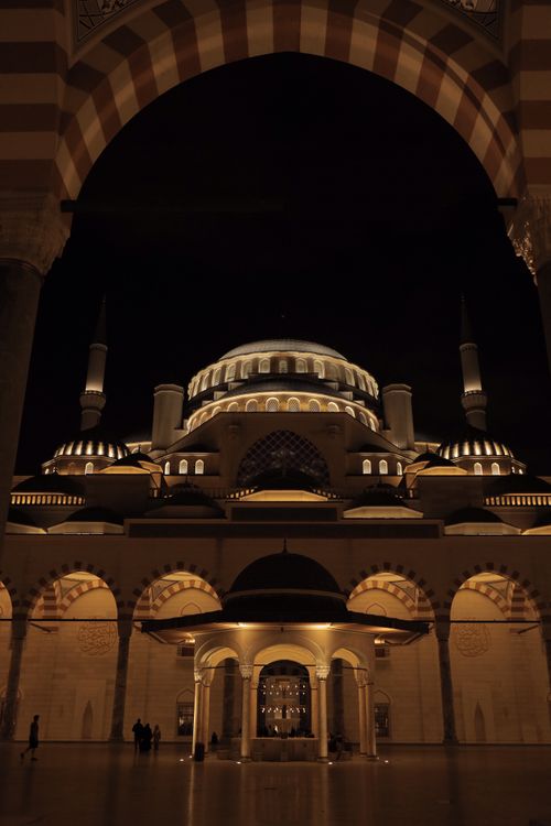Free Stunning night view of the illuminated Camlica Mosque in Istanbul, showcasing its grandeur. Stock Photo