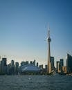 The cn tower is seen from the water