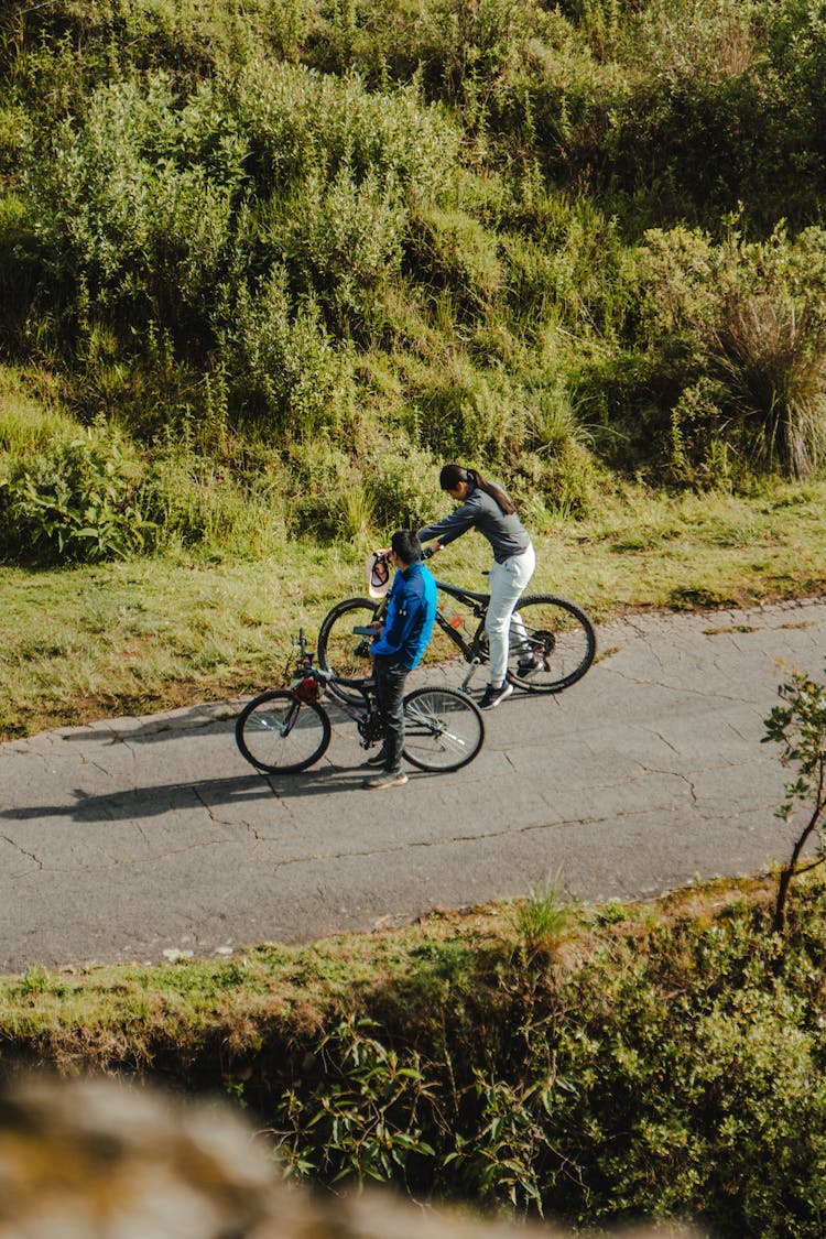 Couple On Bicycles On Road