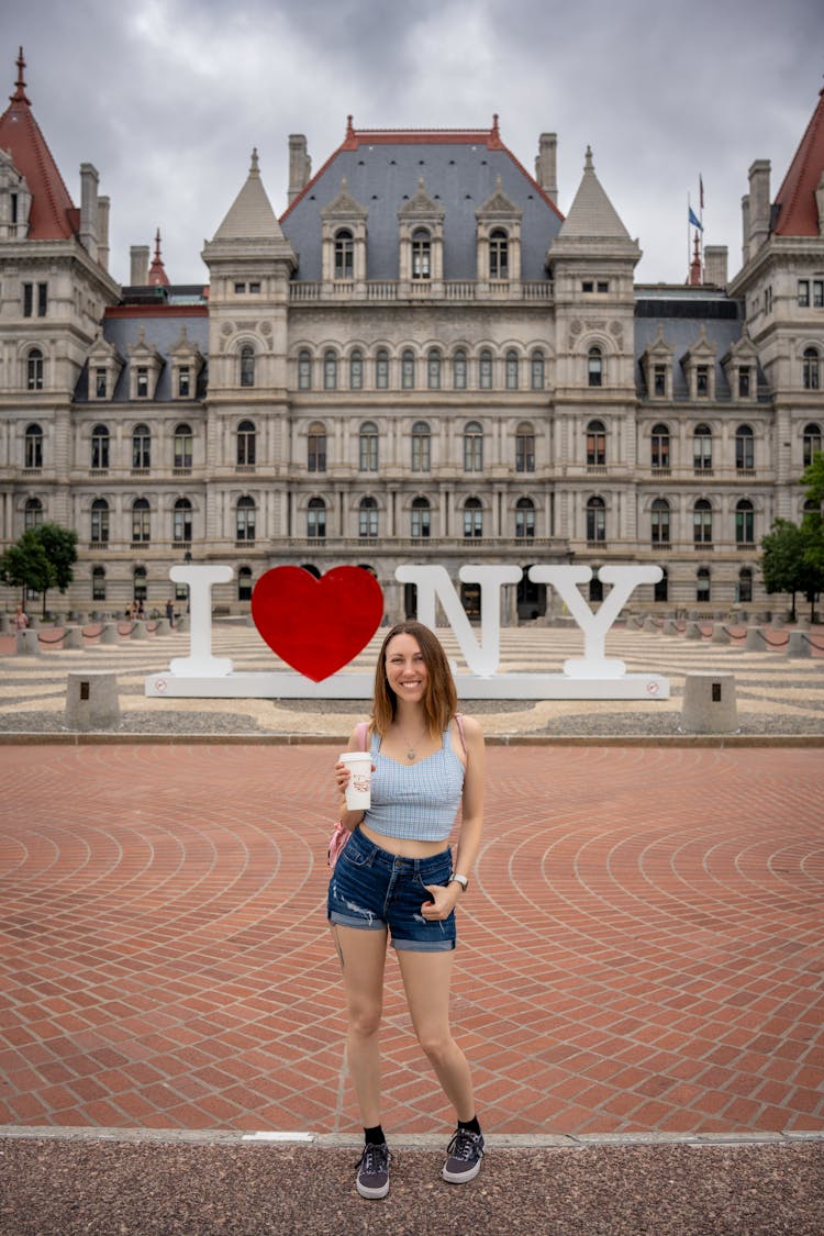 Woman In Front Of New York State Capitol