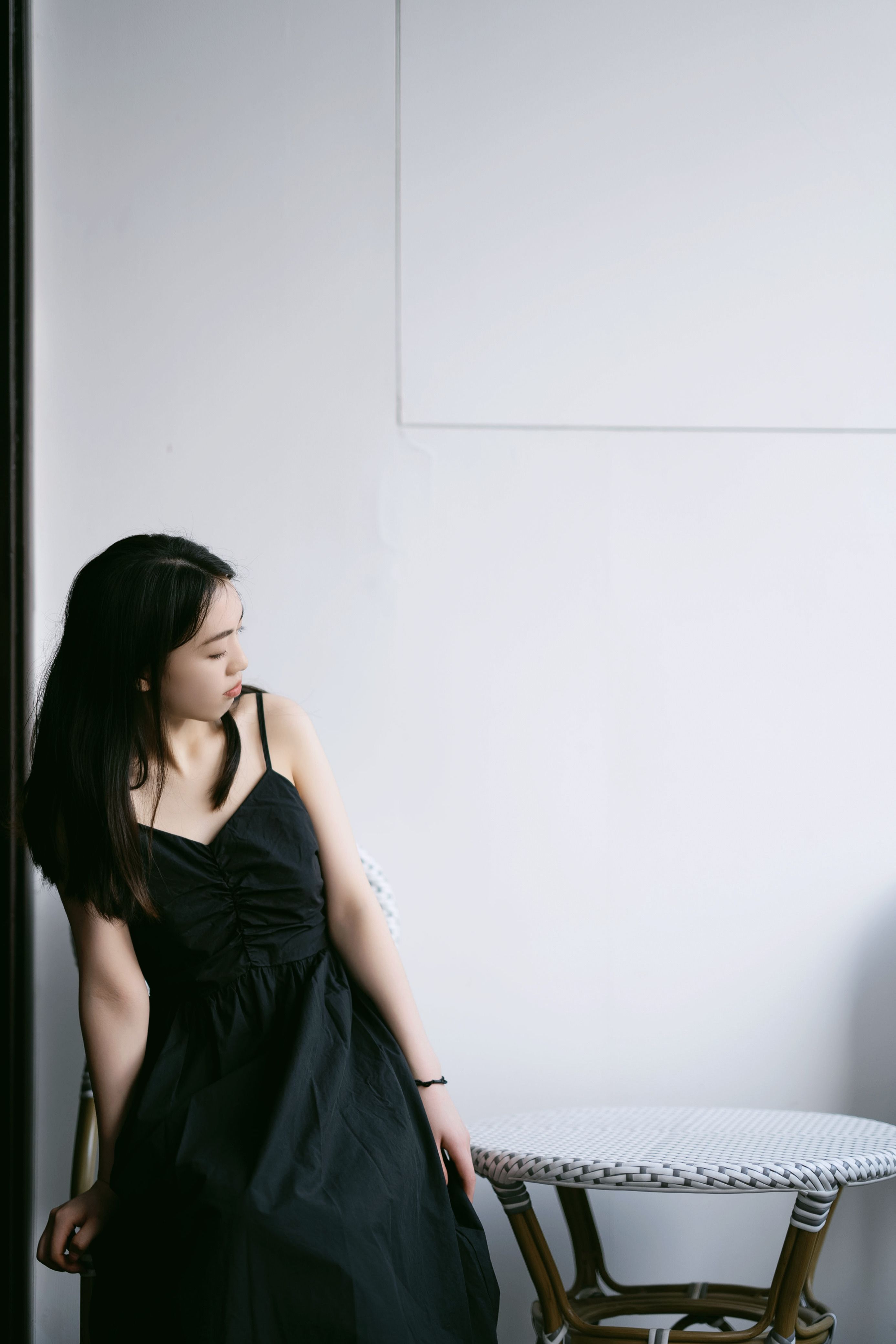 A Woman Wearing a Black Dress · Free Stock Photo
