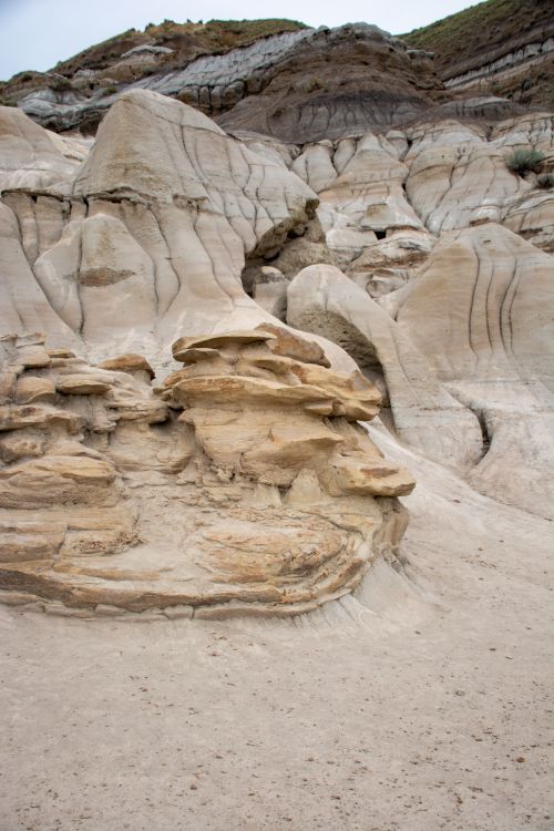Free Stunning hoodoos in Drumheller's Badlands showcase unique sandstone formations. Stock Photo