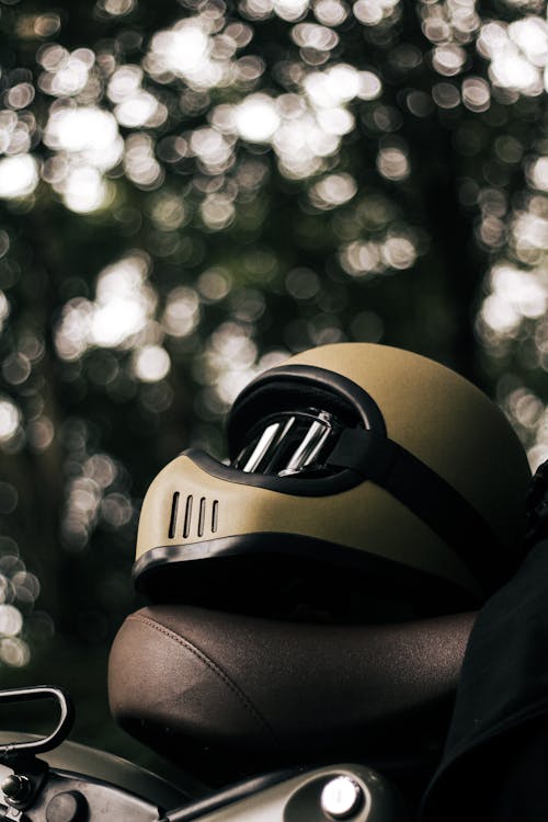 Close-up of a Helmet Lying on a Motorcycle Seat