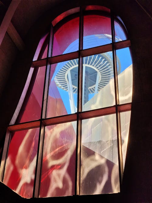 View of the Space Needle through the Window of the Museum of Pop Culture in Seattle, Washington 