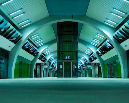 Symmetrical View of the Interior of an Empty Subway Station 