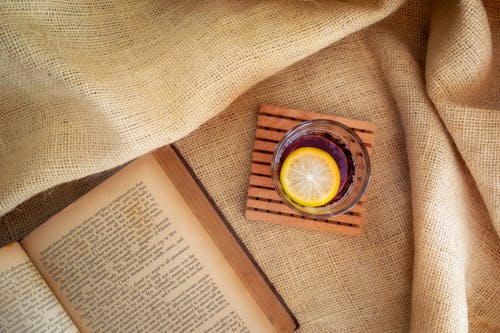 Top View of an Open Book and Tea 