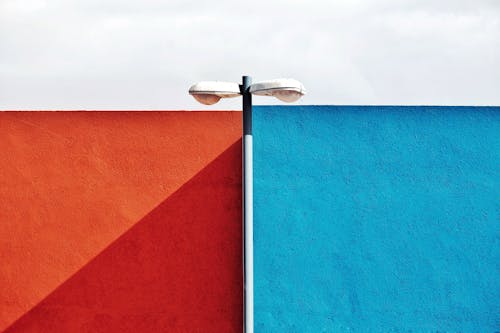 Street Lamp over Blue and Red Wall