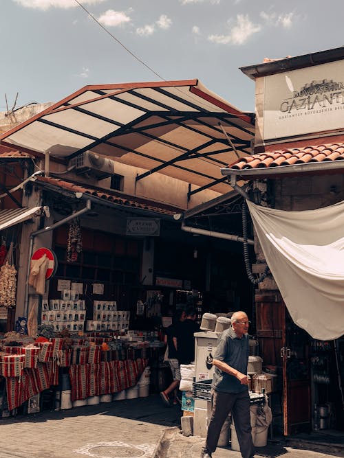 Foto stok gratis bazar, berjalan, diterangi matahari