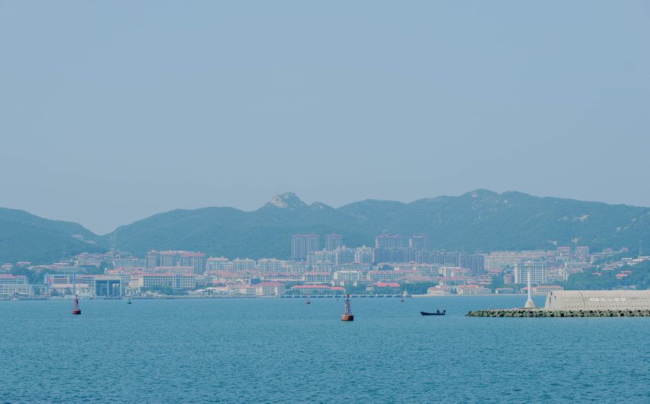 Weihai - Scenic coastal city view with clear blue water