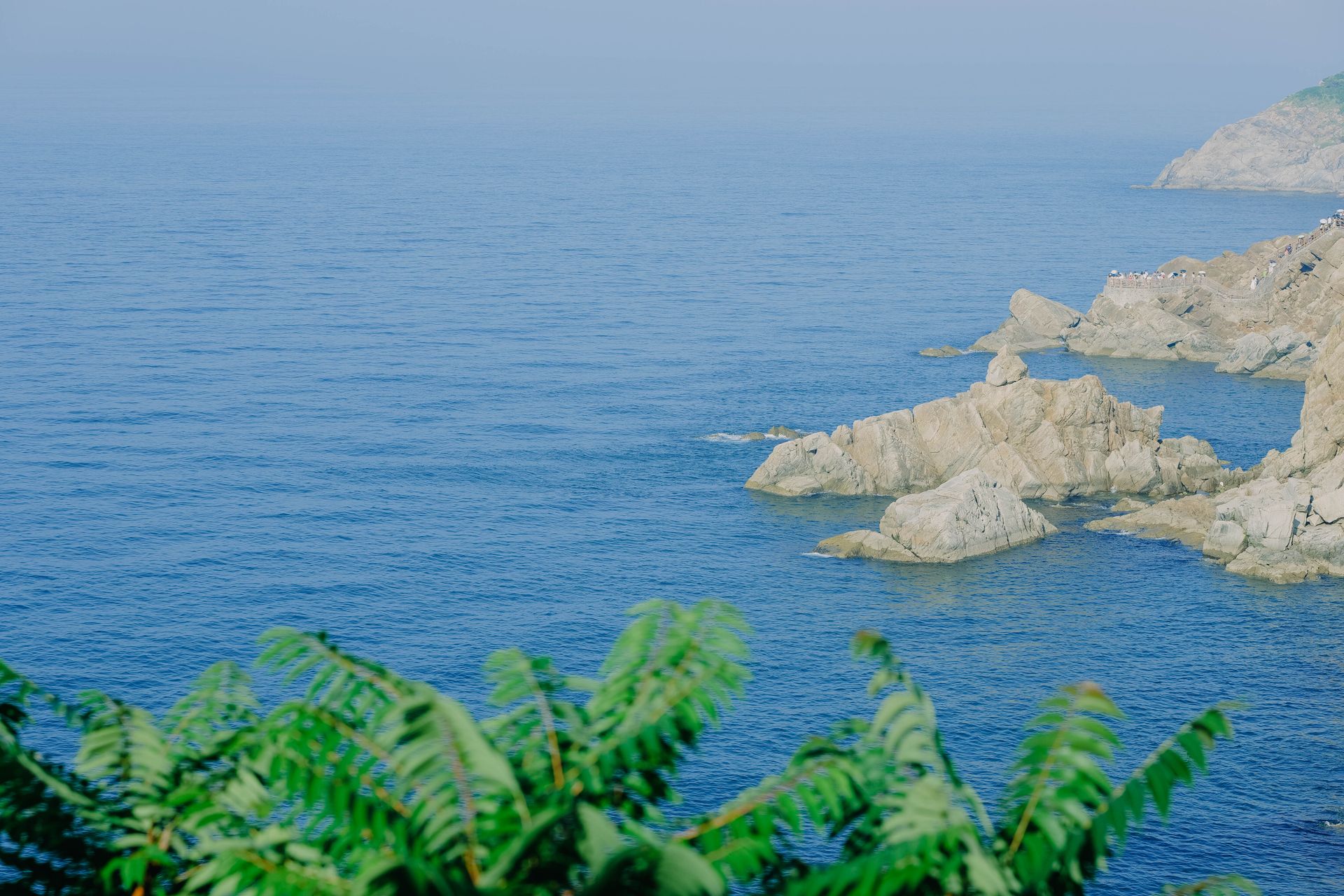 A stunning view of the rocky coastline in Weihai, Shandong Province, China.