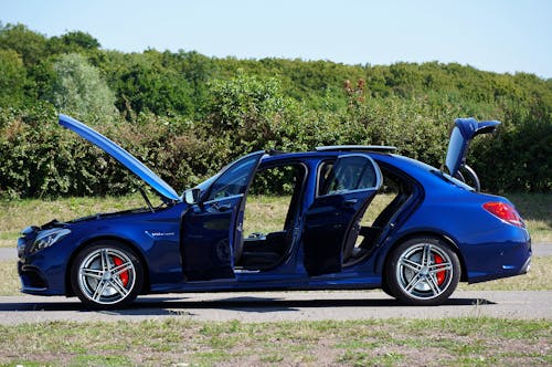 Mercedes C63 with Open Doors and Hood