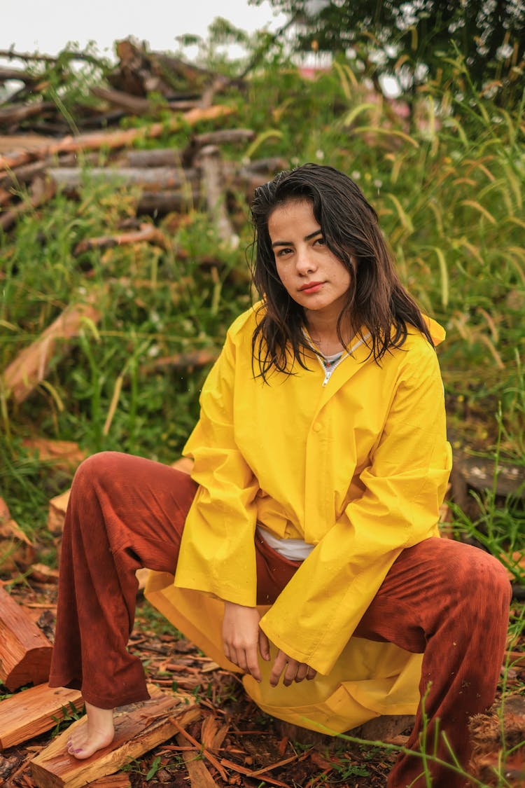 Teenager In Raincoat