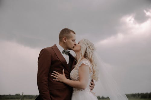 Newlywed Couple Kissing