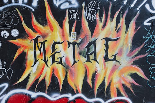 Metal Music Graffiti Painted on a Wall