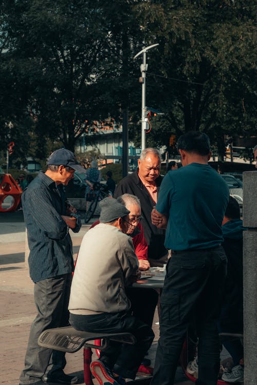 Elderly Men Meeting on Street in Boston, USA