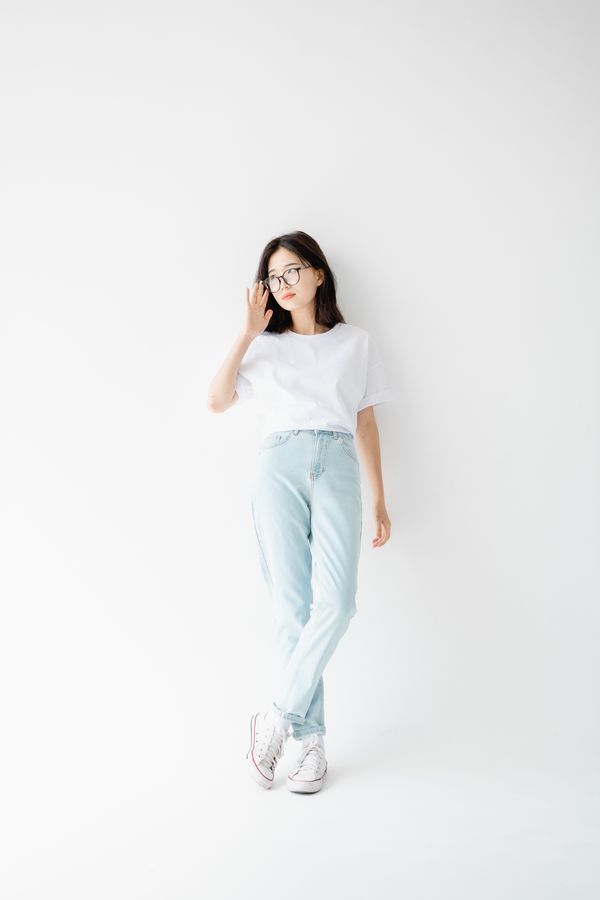 Woman wearing linen-blend pants with a basic white top