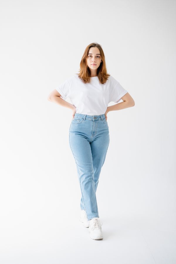 Light-wash mom jeans with white tee