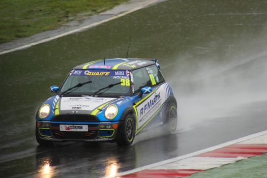 Racing Car on Wet Race Track